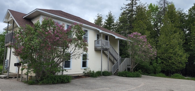 view of home's exterior featuring a balcony