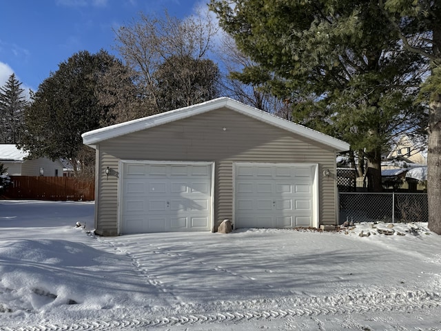 view of snow covered garage