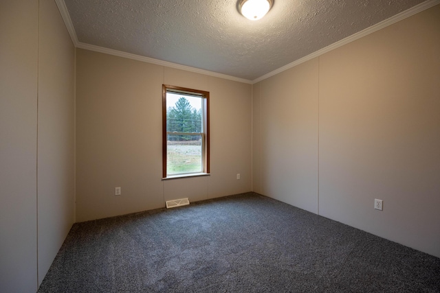 carpeted spare room with a textured ceiling and ornamental molding