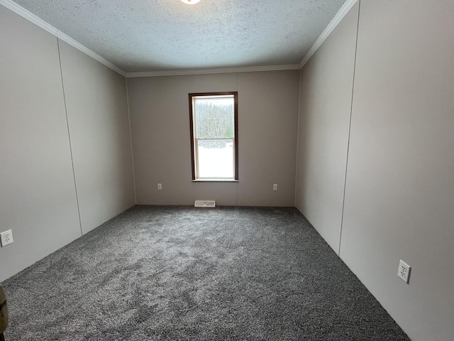 unfurnished room featuring carpet, crown molding, and a textured ceiling