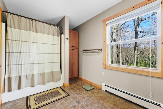 bathroom featuring a baseboard heating unit