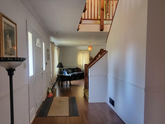 entrance foyer with dark hardwood / wood-style flooring