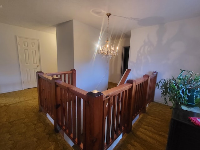 interior space featuring a notable chandelier and carpet