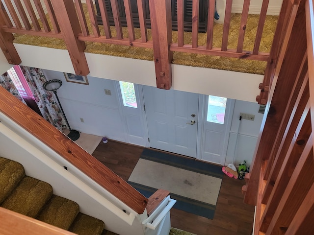 entrance foyer featuring dark hardwood / wood-style floors