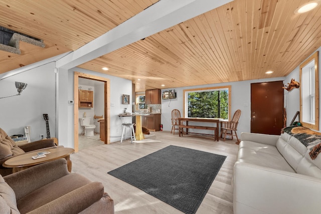 living room featuring light wood-type flooring and wood ceiling