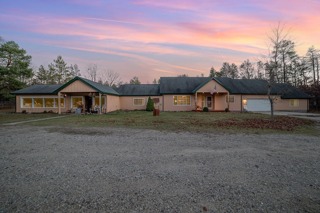 ranch-style house featuring a garage