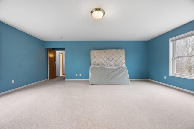 unfurnished bedroom featuring carpet