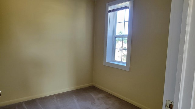 empty room with carpet flooring