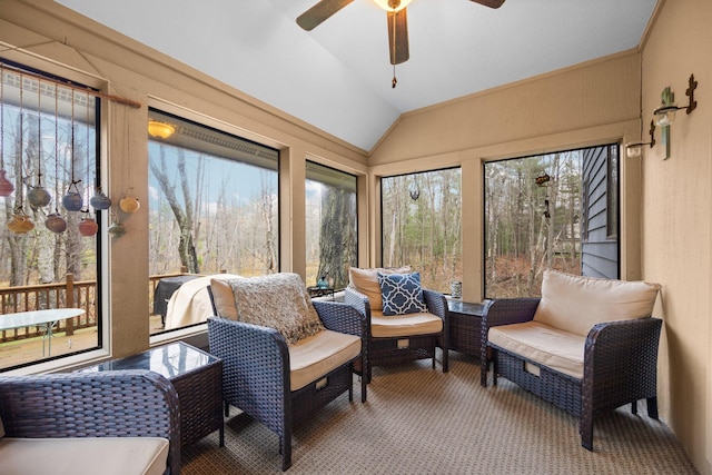 sunroom / solarium with lofted ceiling and ceiling fan