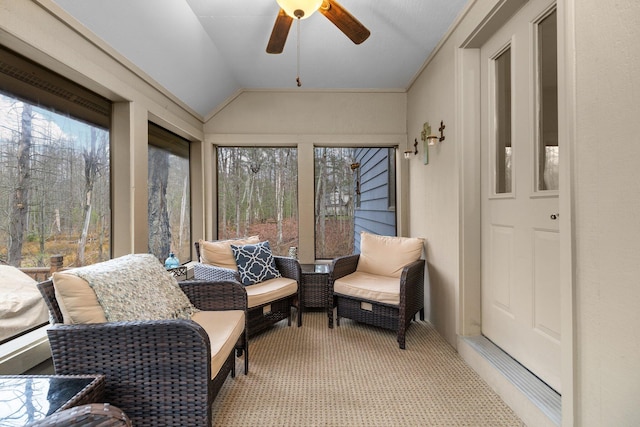 sunroom with vaulted ceiling and ceiling fan