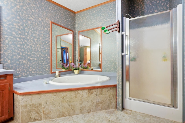 bathroom with vanity, shower with separate bathtub, a textured ceiling, and ornamental molding