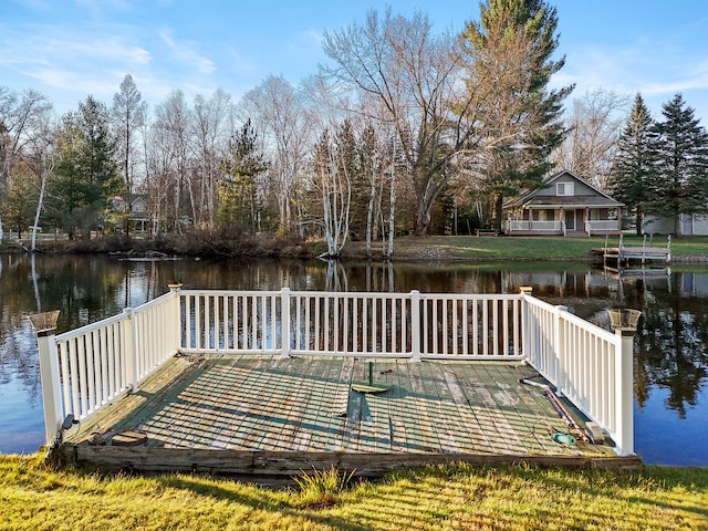 dock area with a deck with water view