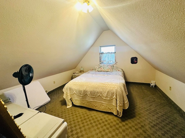 carpeted bedroom featuring a textured ceiling and vaulted ceiling