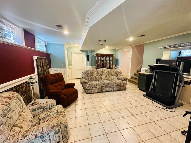 living room with light tile patterned flooring and crown molding