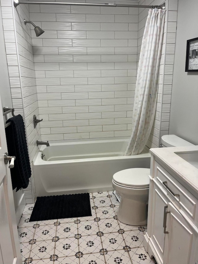 full bathroom featuring shower / bathtub combination with curtain, vanity, and toilet