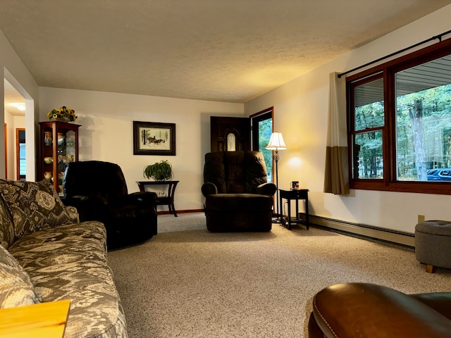 living room with a textured ceiling and a baseboard radiator