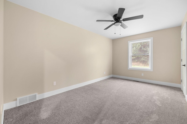 carpeted empty room with ceiling fan