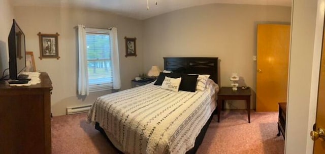 carpeted bedroom featuring a baseboard radiator and lofted ceiling