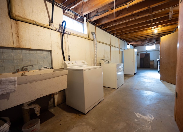 laundry area featuring separate washer and dryer