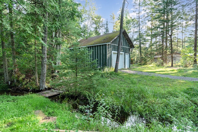 view of outbuilding featuring a garage