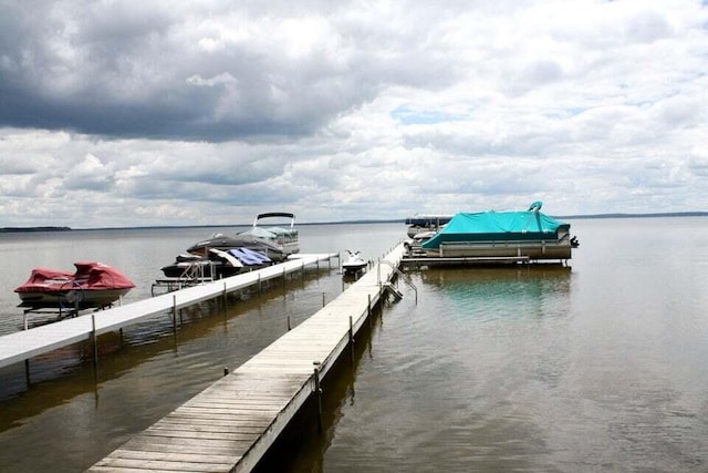 view of dock with a water view