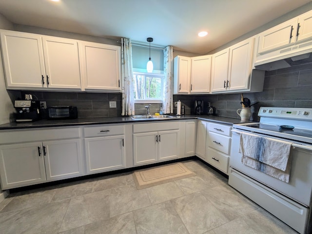 kitchen featuring decorative backsplash, white range with electric stovetop, sink, decorative light fixtures, and white cabinets