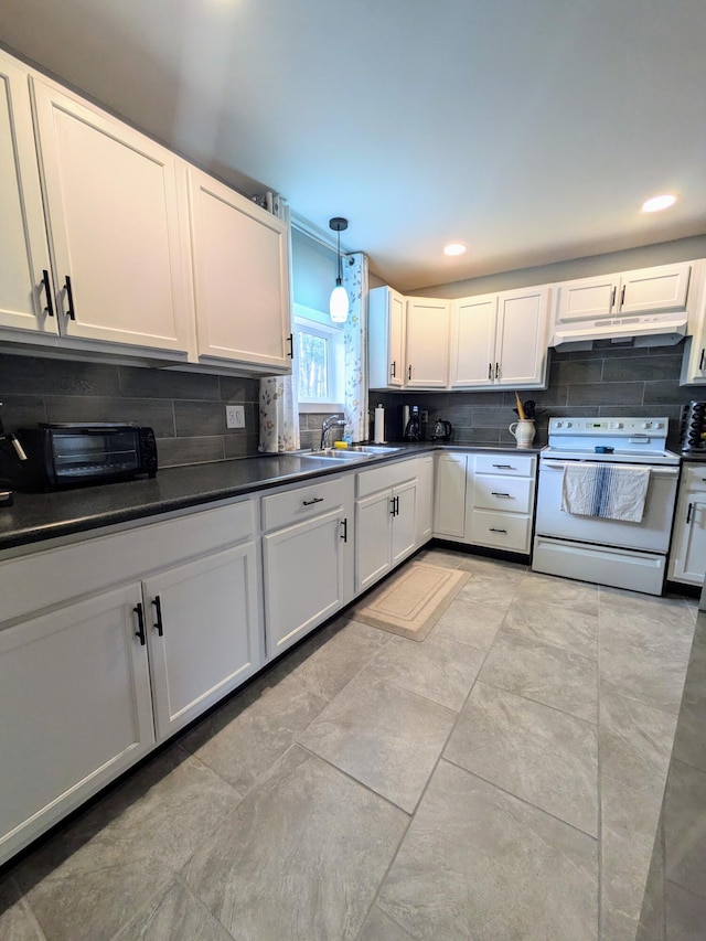 kitchen featuring white range with electric cooktop, pendant lighting, white cabinetry, and backsplash