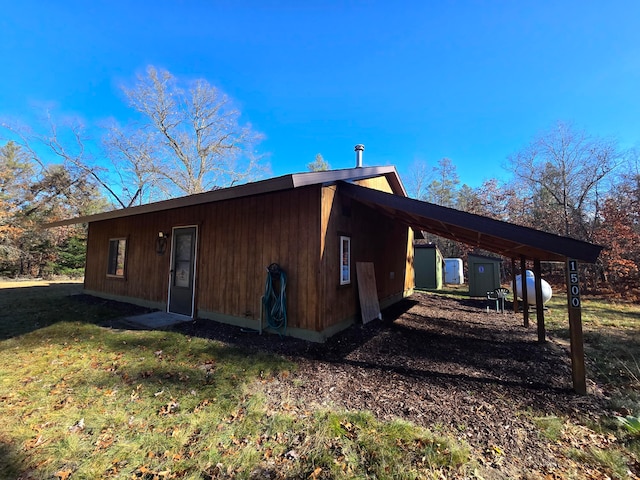 view of home's exterior featuring a yard