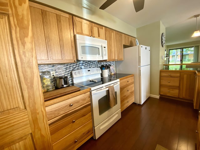 kitchen with ceiling fan, dark wood-type flooring, tasteful backsplash, pendant lighting, and white appliances