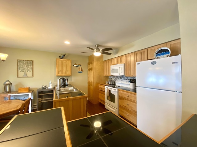 kitchen with white appliances, backsplash, sink, wine cooler, and ceiling fan