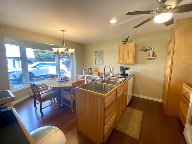 kitchen featuring pendant lighting, dark hardwood / wood-style flooring, and kitchen peninsula