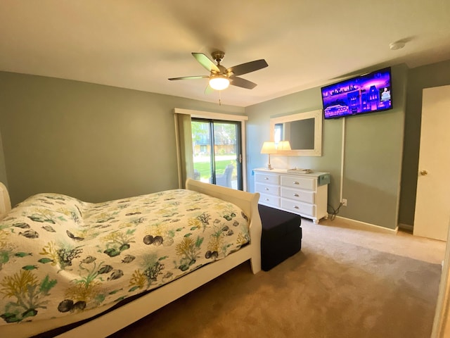 bedroom with light carpet and ceiling fan