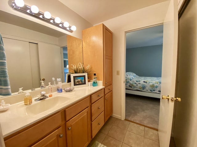 bathroom featuring tile patterned floors and vanity