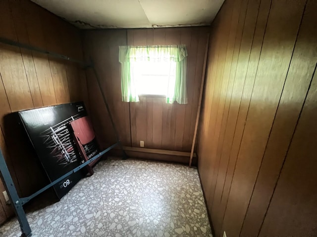 empty room with wooden walls