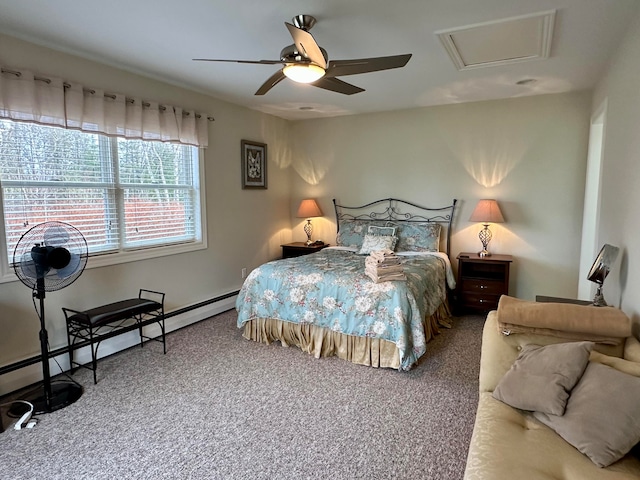 bedroom featuring baseboard heating, ceiling fan, and carpet