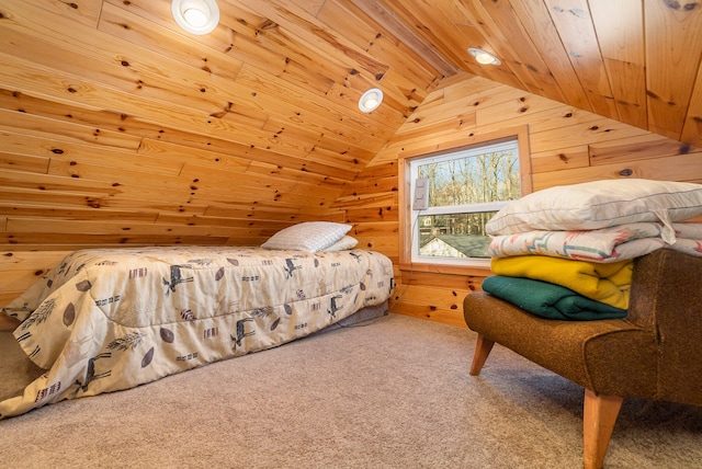 bedroom featuring carpet flooring, vaulted ceiling, wooden ceiling, and wood walls