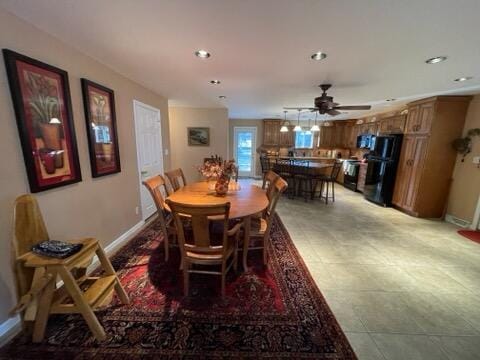 dining area with ceiling fan