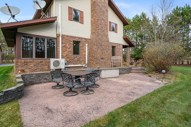 view of patio / terrace featuring ac unit