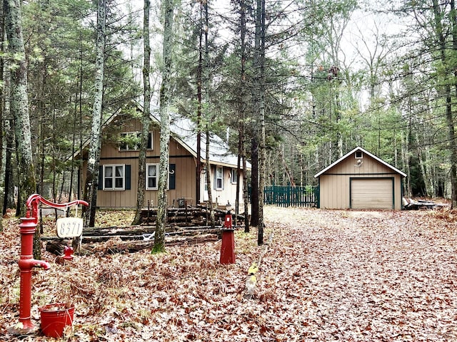 exterior space featuring an outdoor structure and a garage