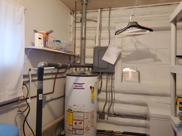 utility room featuring gas water heater