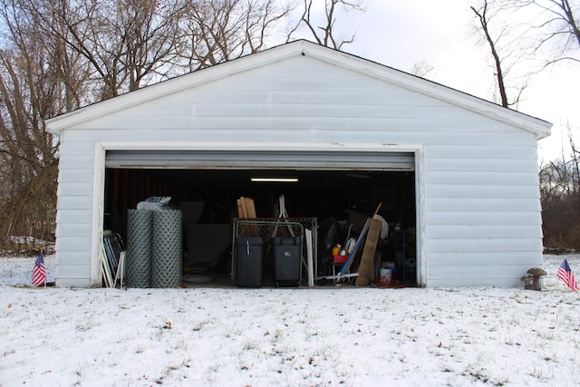 view of snow covered garage