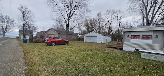 view of yard with an outbuilding and a deck