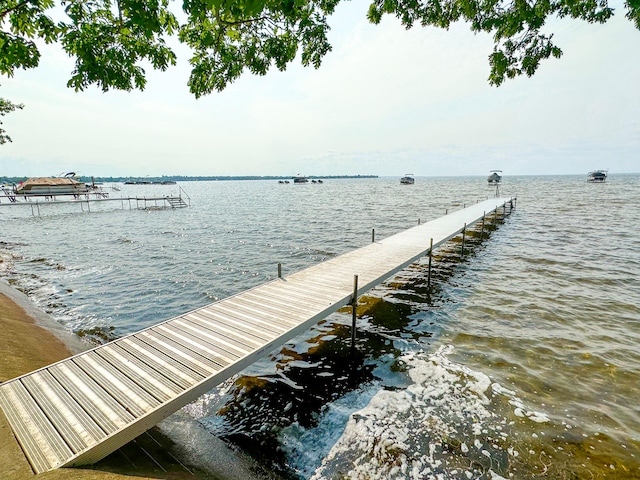 dock area featuring a water view