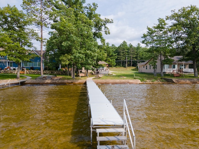 dock area with a water view