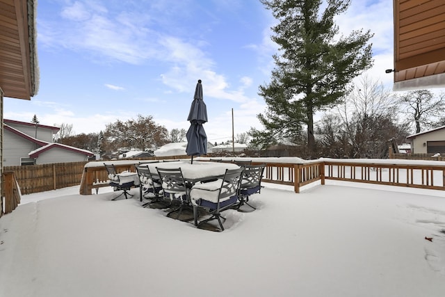 view of snow covered deck