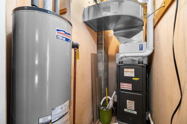 utility room featuring gas water heater