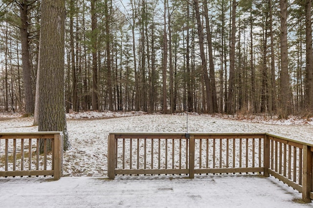 view of snow covered deck