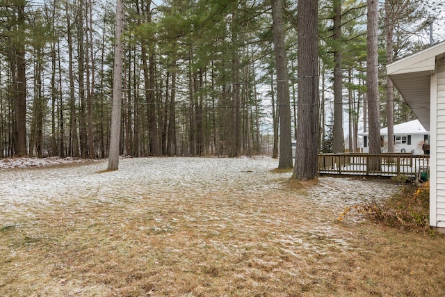 view of yard featuring a wooden deck