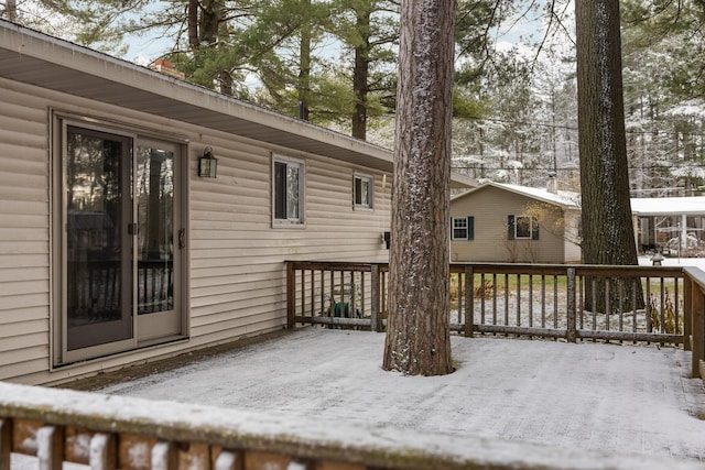 view of snow covered deck