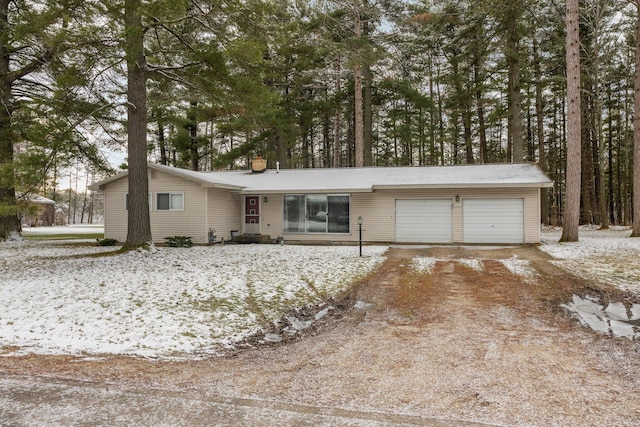 ranch-style home with a garage